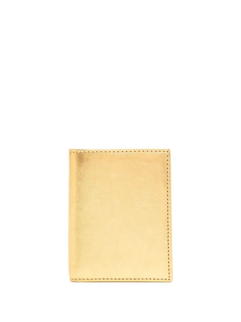 Comme Des Garçons metallic bi-fold cardholder in Golden | Stylemi