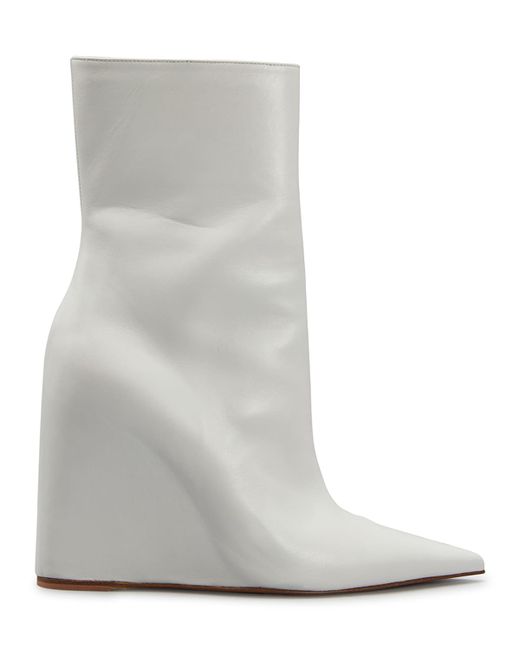 Amina Muaddi Pernille 95mm Pointed Wedge Booties in White | Stylemi